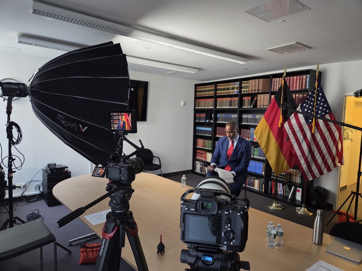 New Take Films set at the German Embassy with flags